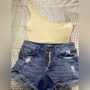 The brand of these pair of shorts are just USA the color the the pair blue Jean